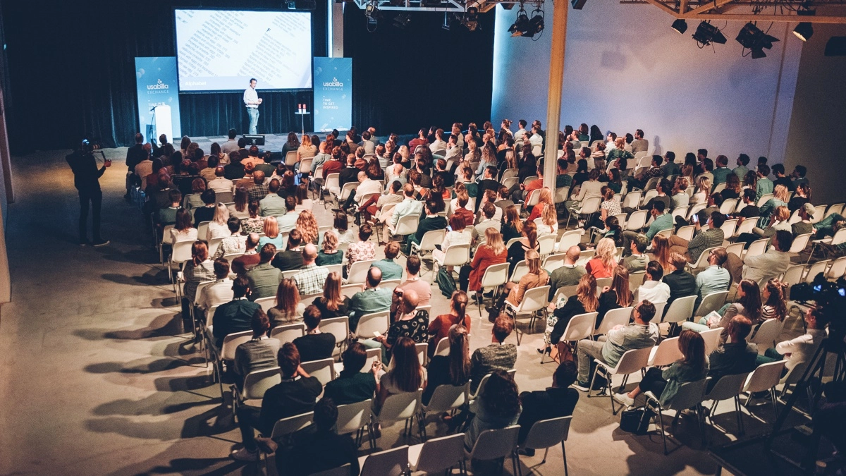 Chris How delivering keynote at Usabilla Exchange conference in Amsterdam